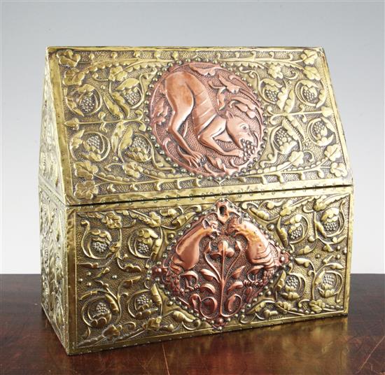 An Arts and Crafts embossed brass and copper casket, circa 1900, length 30cm, height 28cm